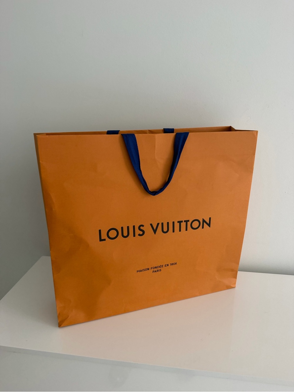 Louis Vuitton Orange Gift Bag with Dark Blue Handles